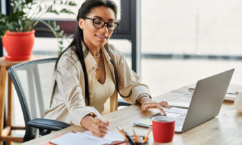 A young woman reading about how to get a work from home job